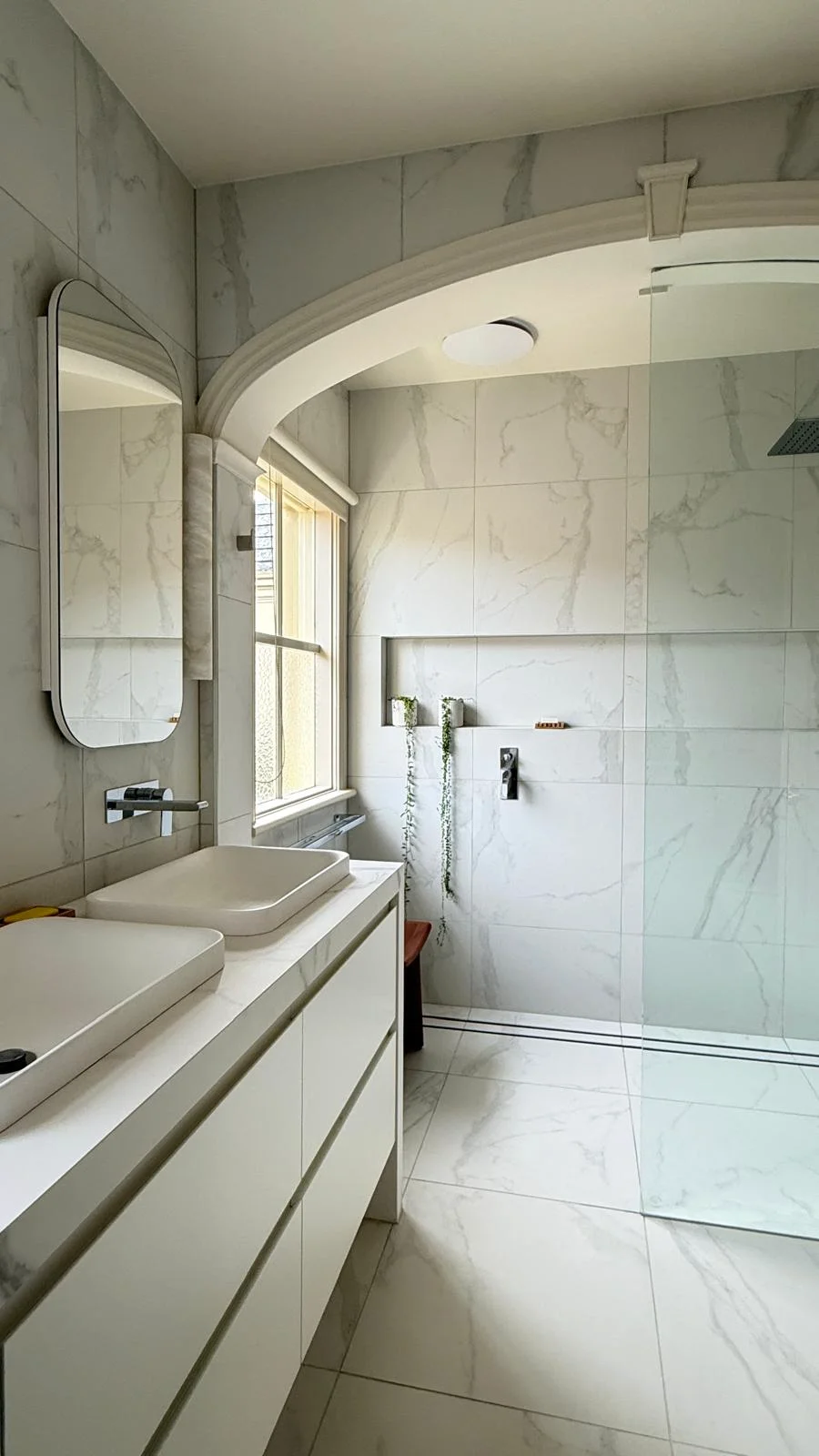 Bathroom renovation with large format tiles