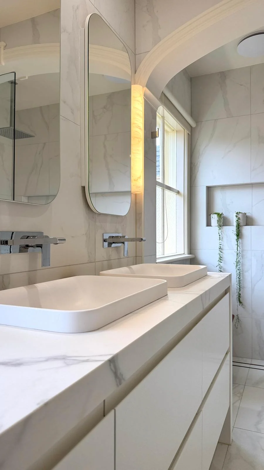 Bathroom renovation with mosaic feature
