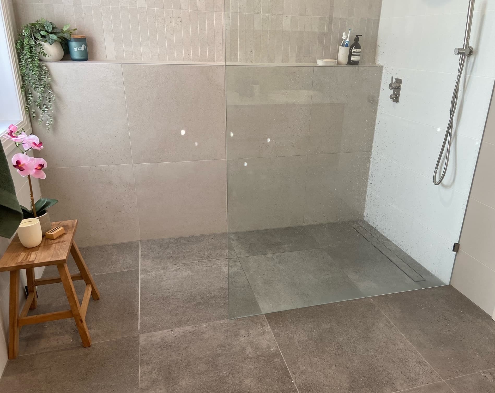 Spacious bathroom renovation with wet area tiling