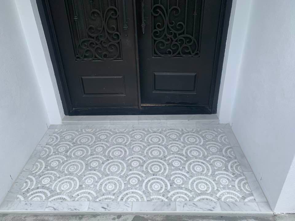 Mosaic floor tiling medallion entryway